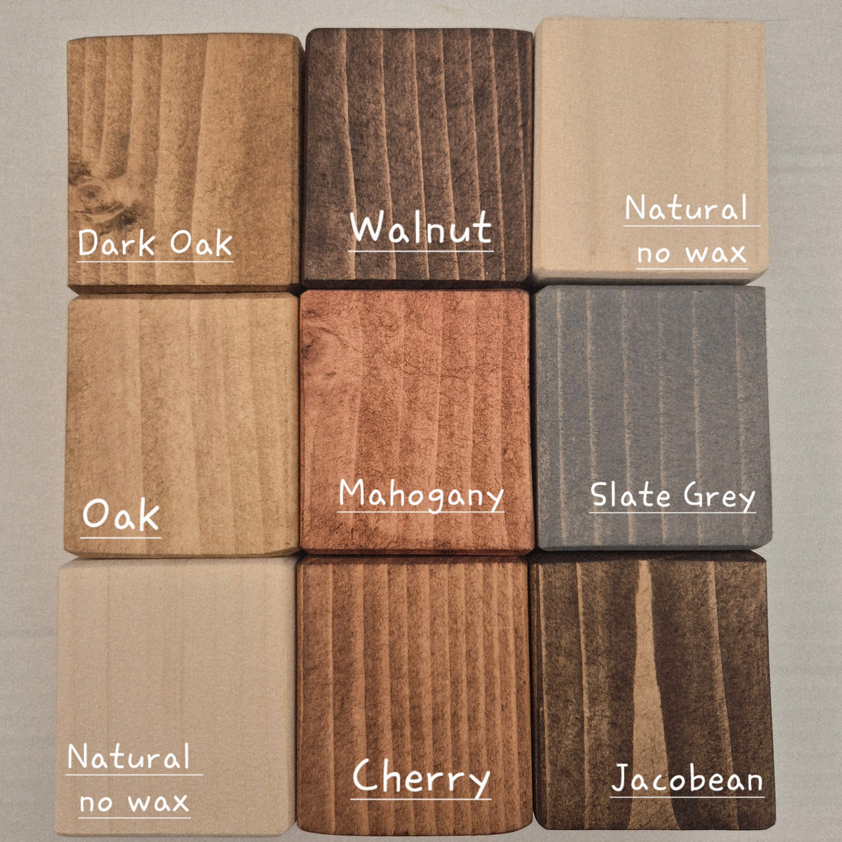 Wood finish chart showing eight EmKa stain options on solid pine samples, from Natural to Jacobean
